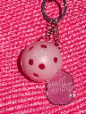 Daisy Dink Pickleball Keychain Hanging from bag